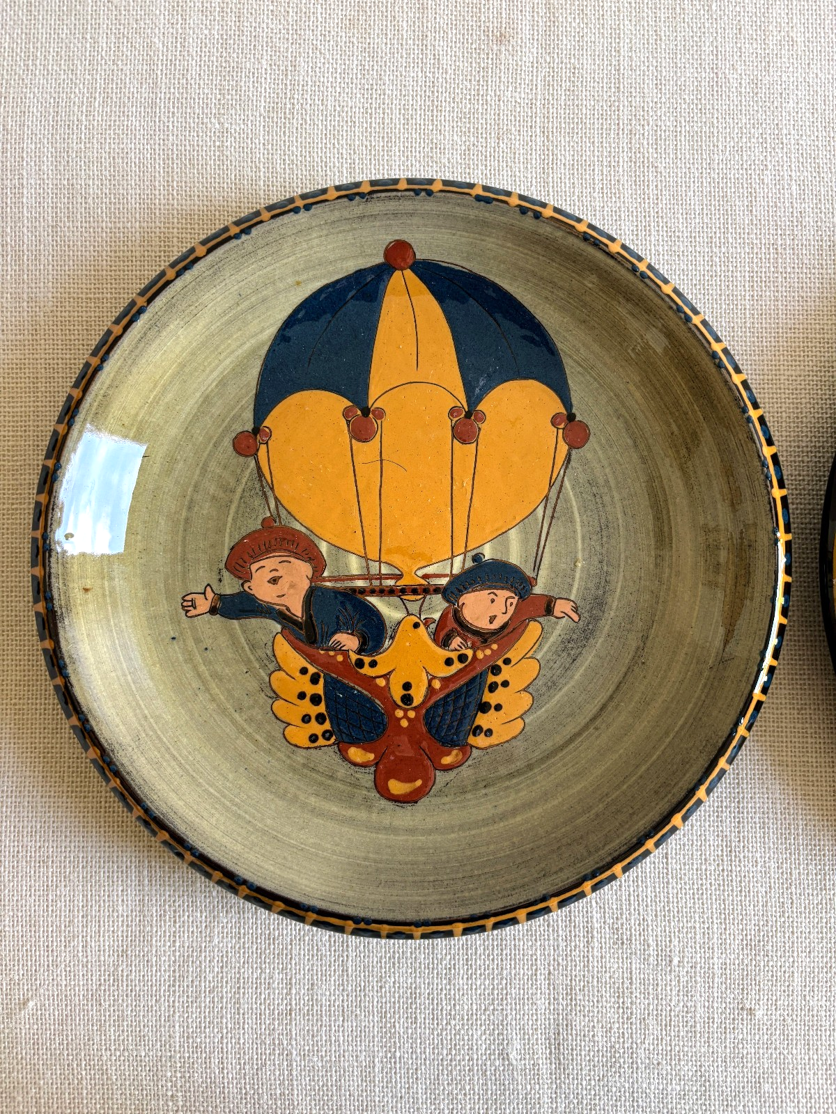 Swiss Folk Art Pottery Wall Plates with Hot Air Balloon Motif
